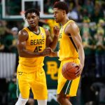 Baylor guard Davion Mitchell (45) and guard MaCio Teague celebrate after their defeat of TCU at Ferrell Center